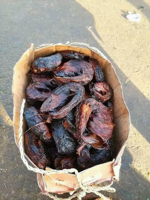 1carton of full medium sizes of dried catfish